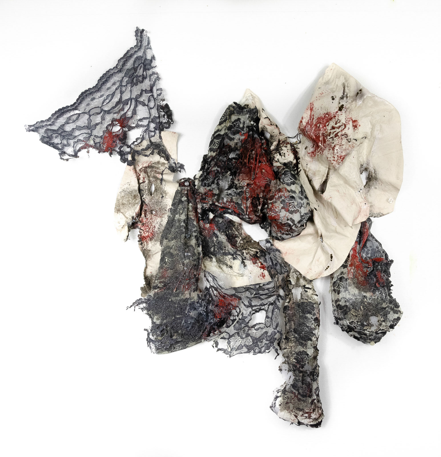 Laced Lipid (2020), 24" x 30". Pleather, Lace, mixed Fabric, Gunpowder, Fire, Thread