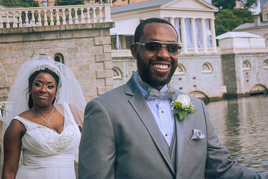 Black African American Bride and Groom in Fairmount Park on the Schuylkill River Behind the Philadelphia Art Museum - Morgan Rogers Burns Photography