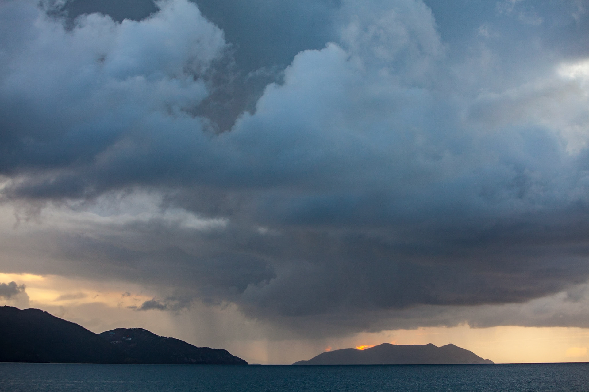 Sunset Rain Over Islands
