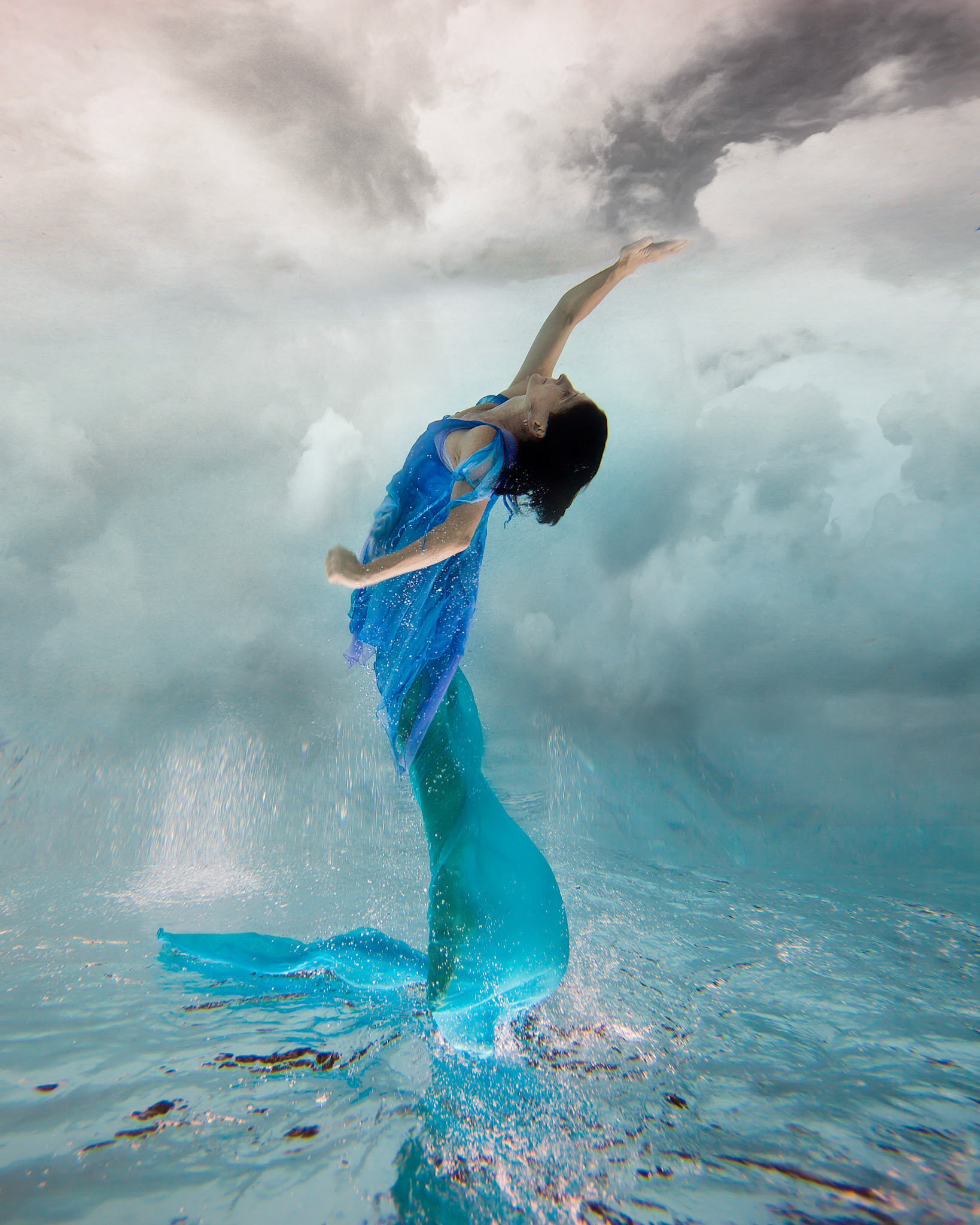 5057-Models demostrating that fashion works underwater as well as above.