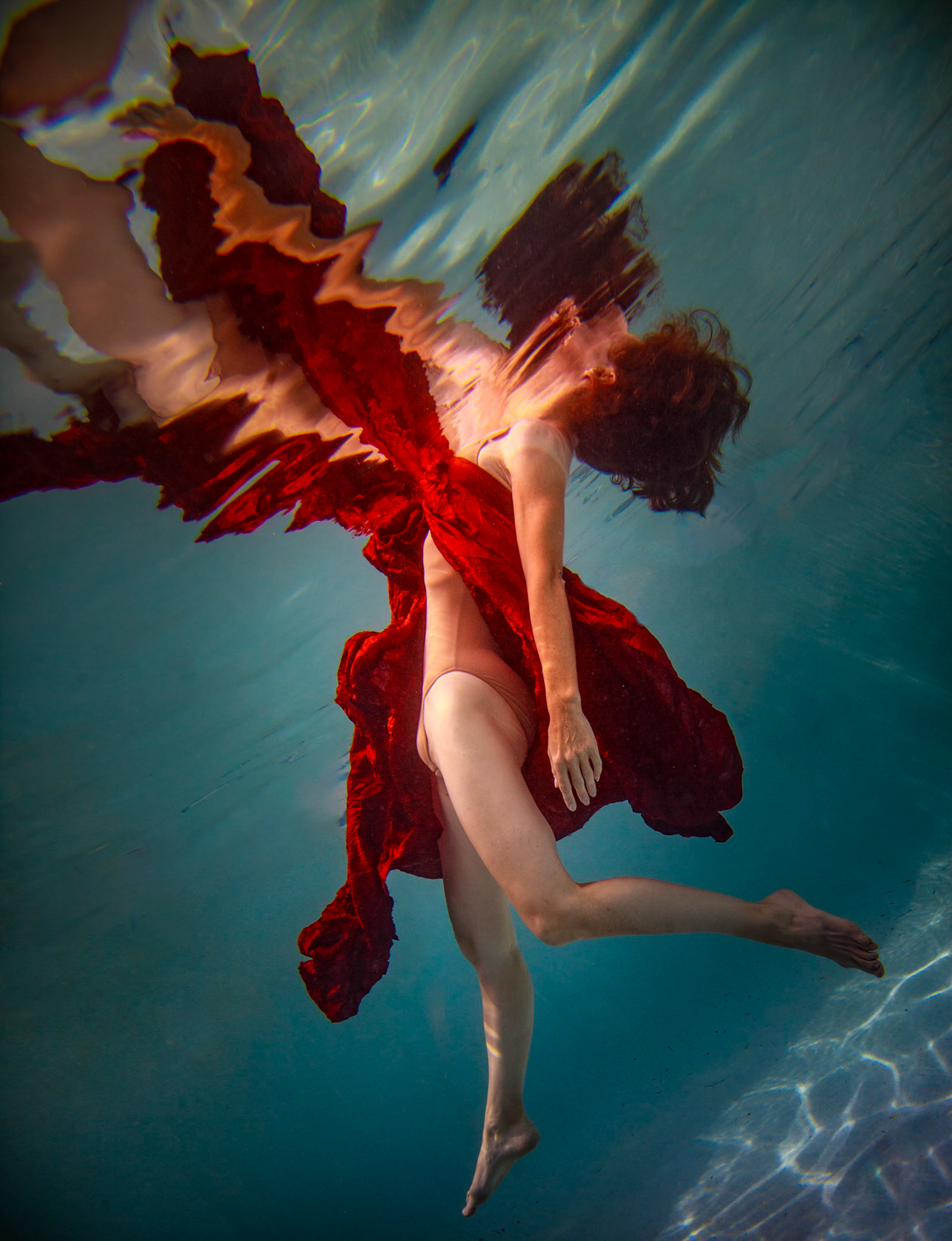 5050 -Stephanie a ballerina of extraordinary ability.  This was all done underwater.-Models demostrating that fashion works underwater as well as above.
