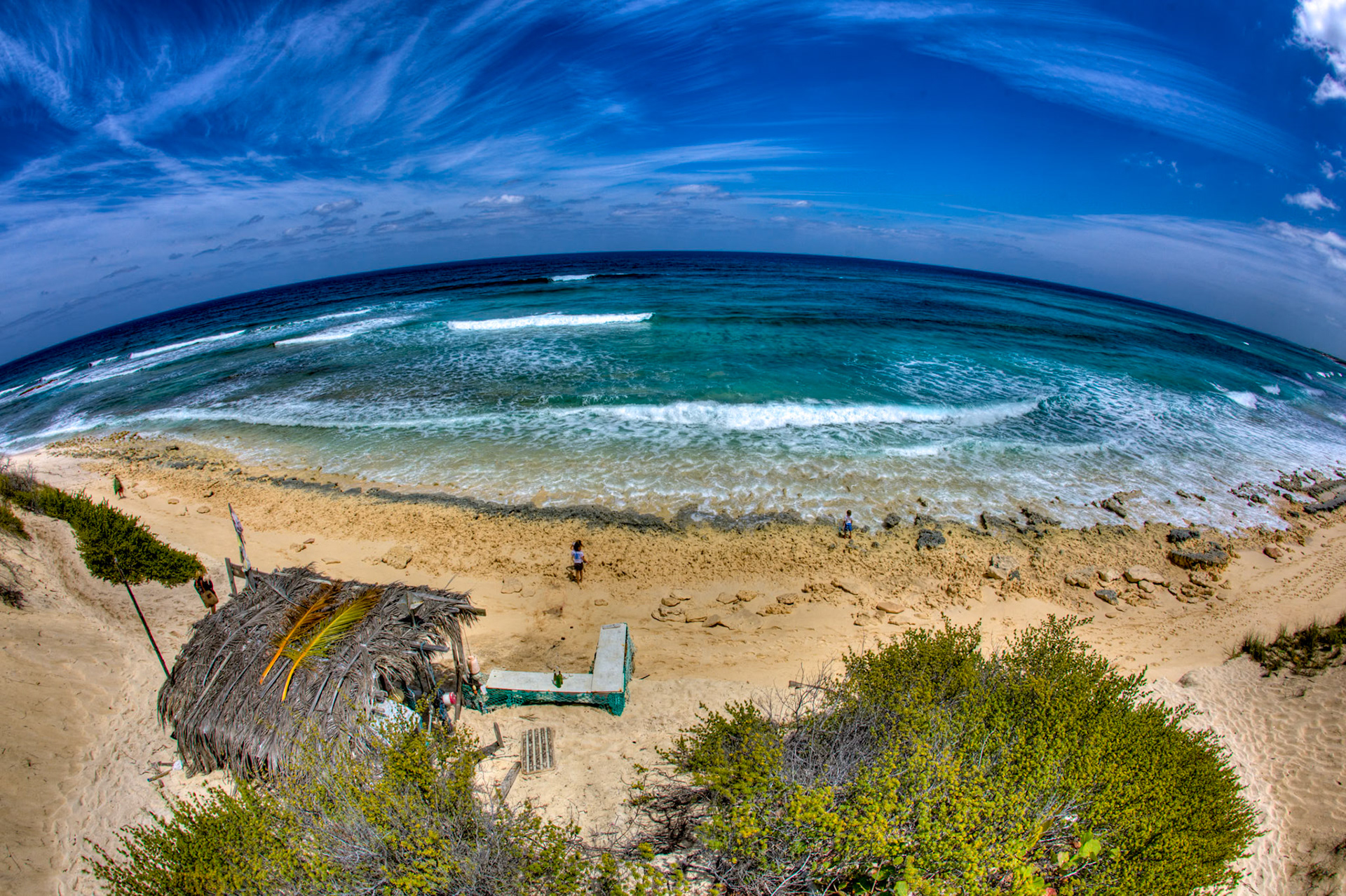 SB373 -Surfers Beach is the most widely known surf break in the BAHAMAS. Surfers Beach is located 2 1/2 miles south of Gregory Town.
