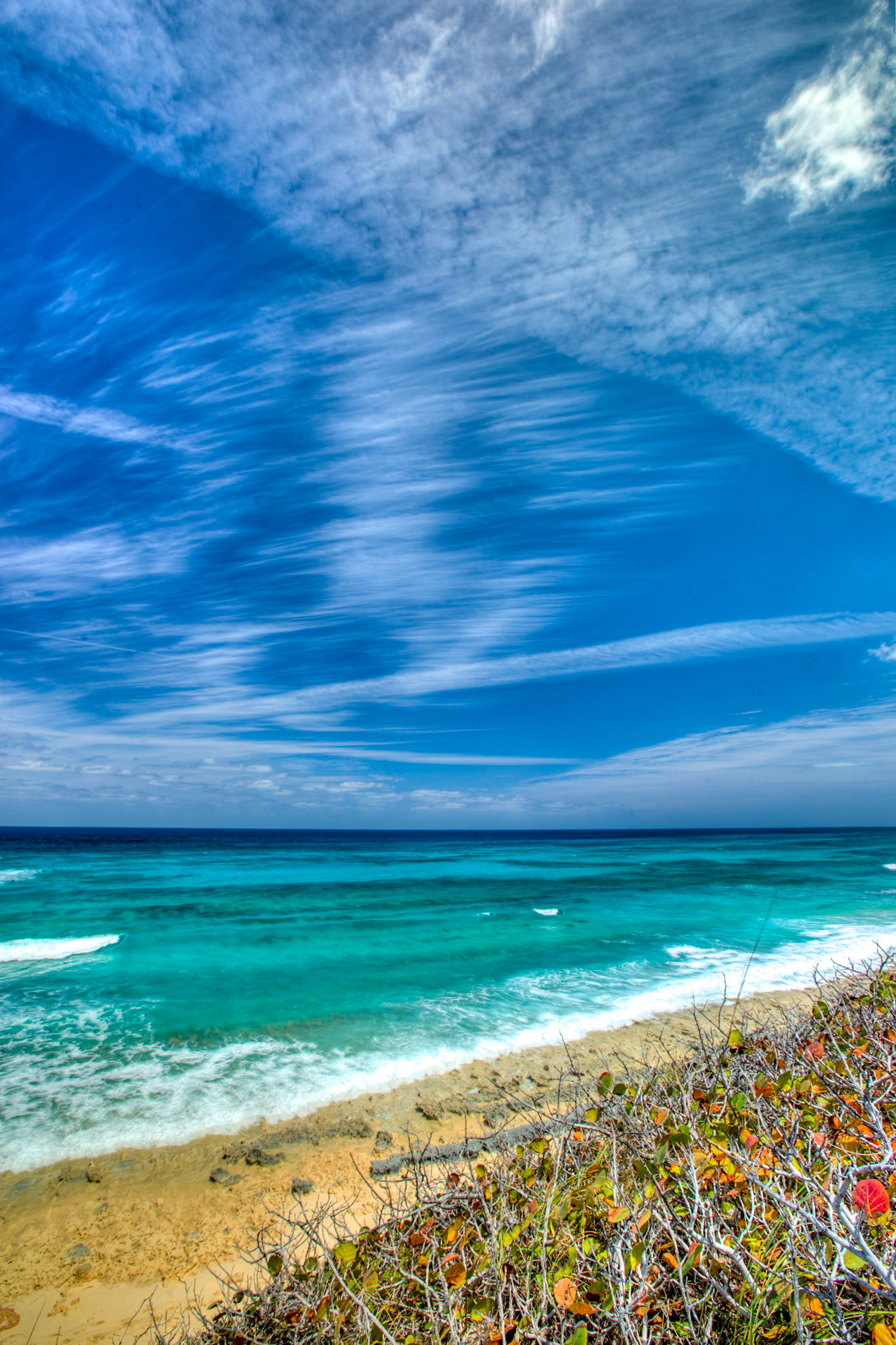 SB376 -Surfers Beach is the most widely known surf break in the BAHAMAS. Surfers Beach is located 2 1/2 miles south of Gregory Town.