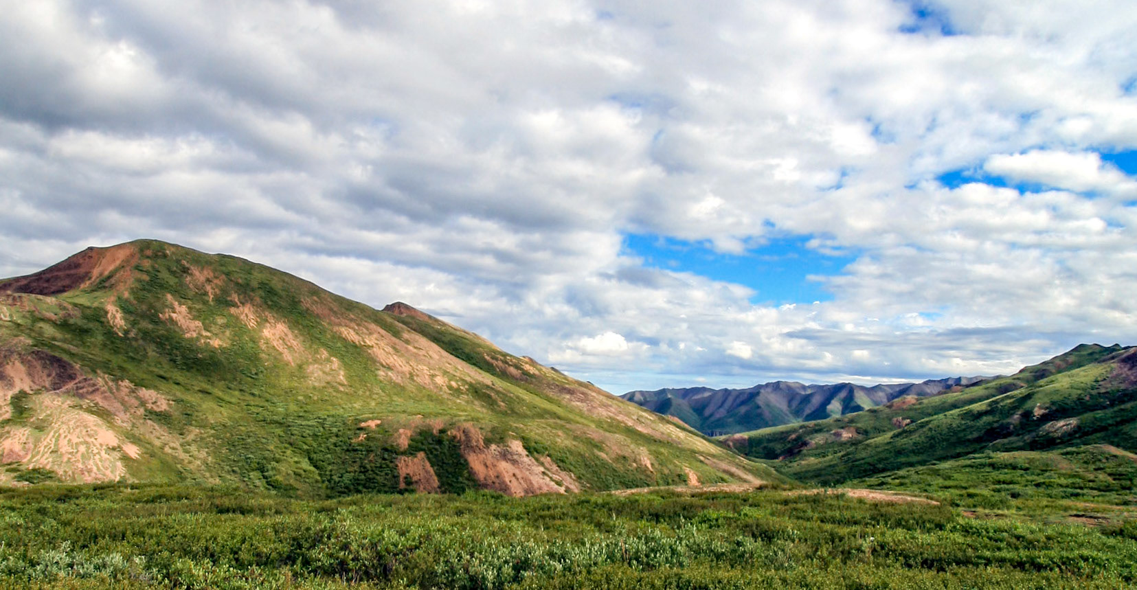 Tundra Ridge Under Cumulus Sky - 2240