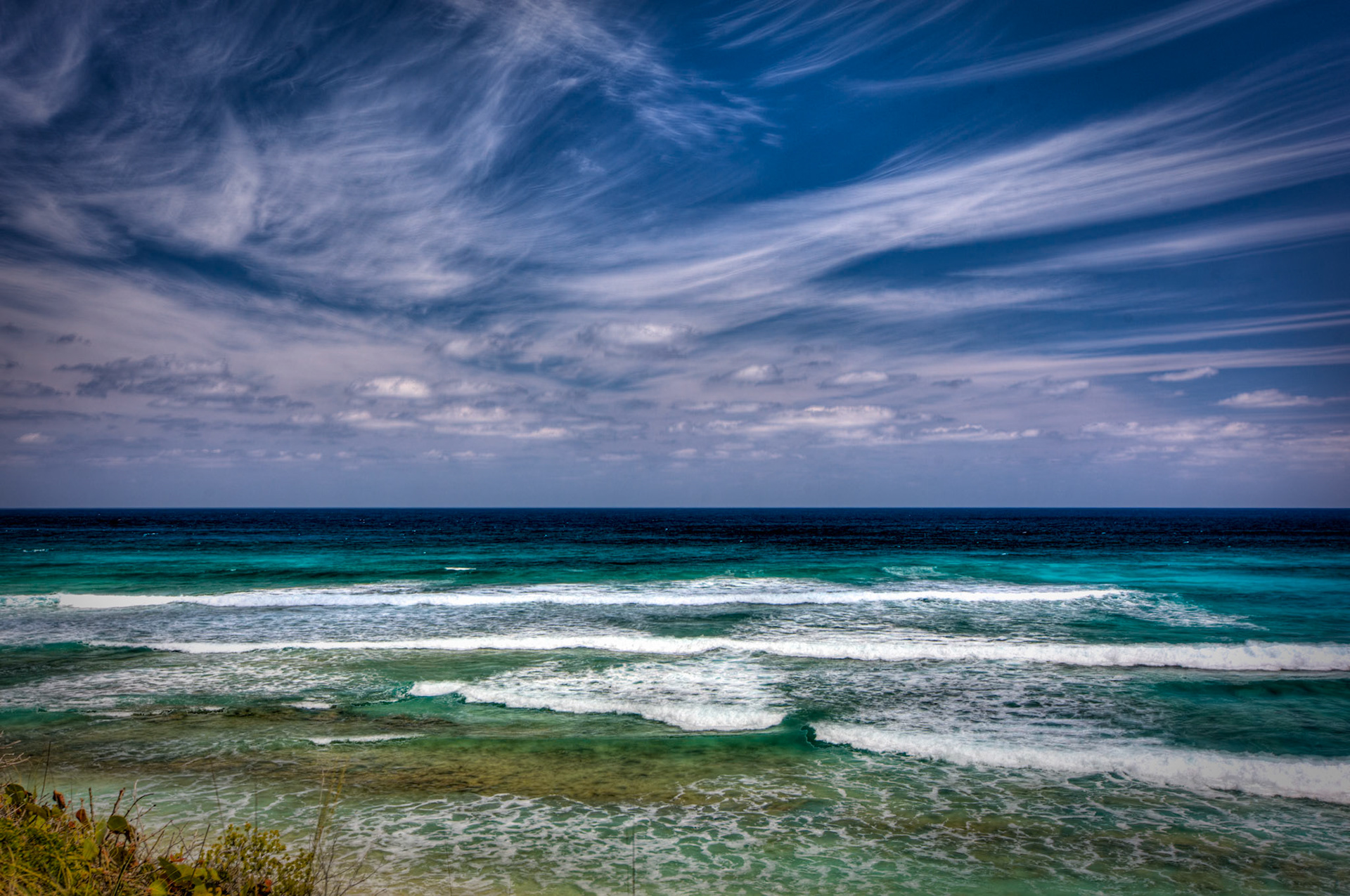 SB370 -Surfers Beach is the most widely known surf break in the BAHAMAS. Surfers Beach is located 2 1/2 miles south of Gregory Town.