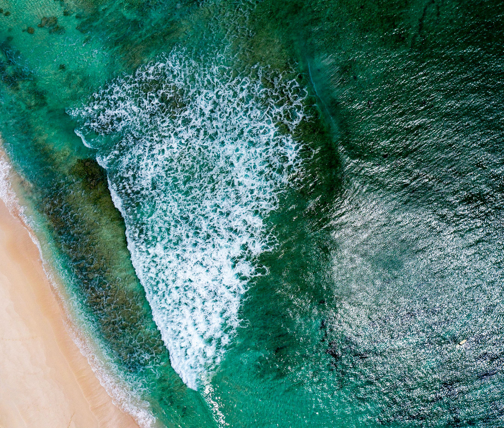 SB385 -Surfers Beach is the most widely known surf break in the BAHAMAS. Surfers Beach is located 2 1/2 miles south of Gregory Town.