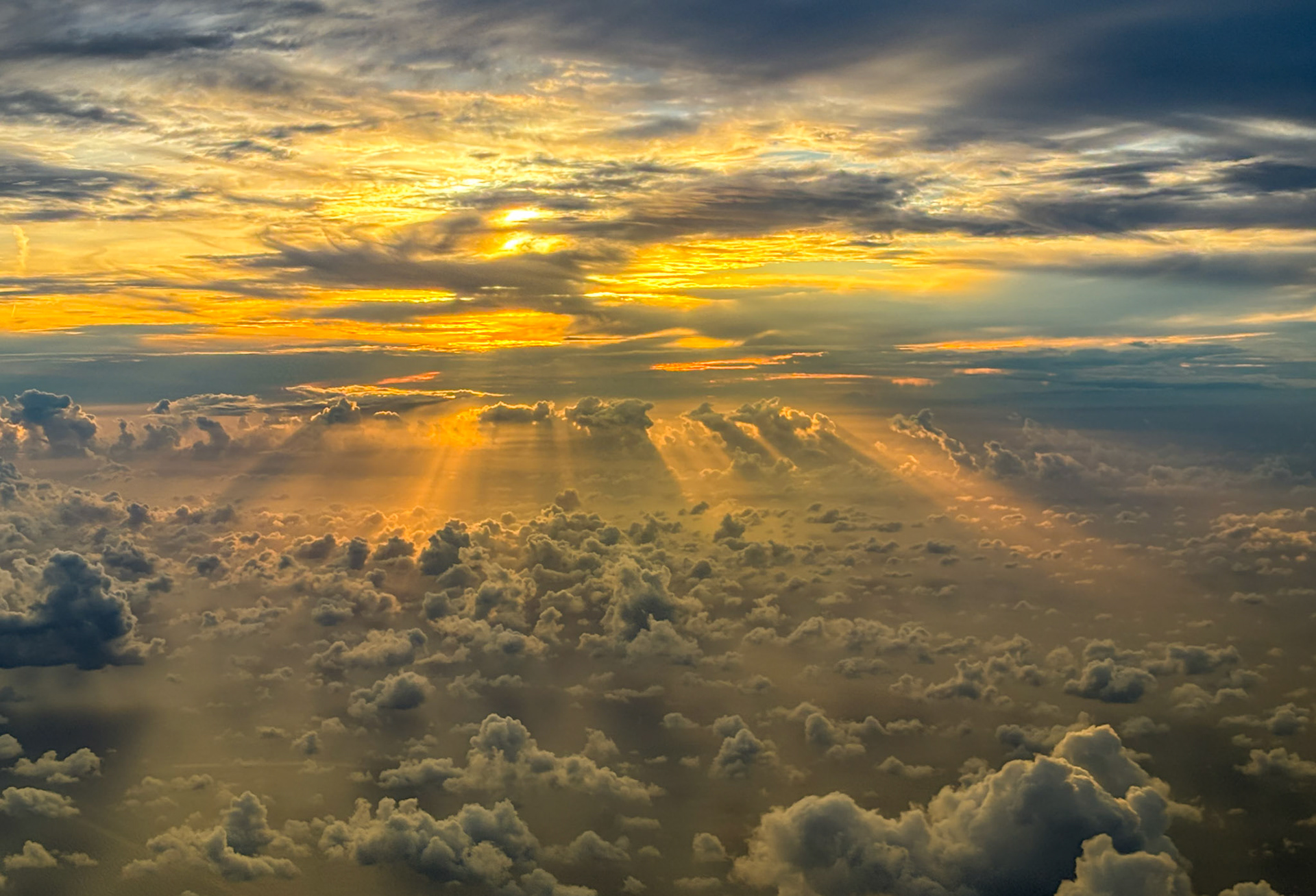 Crepuscular Rays Above the Clouds -4374