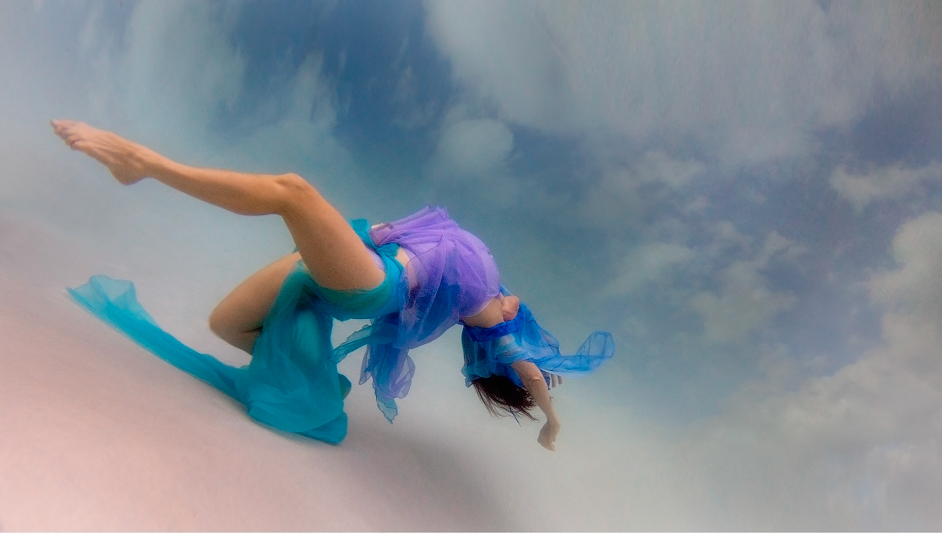 5059-Models demostrating that fashion works underwater as well as above.