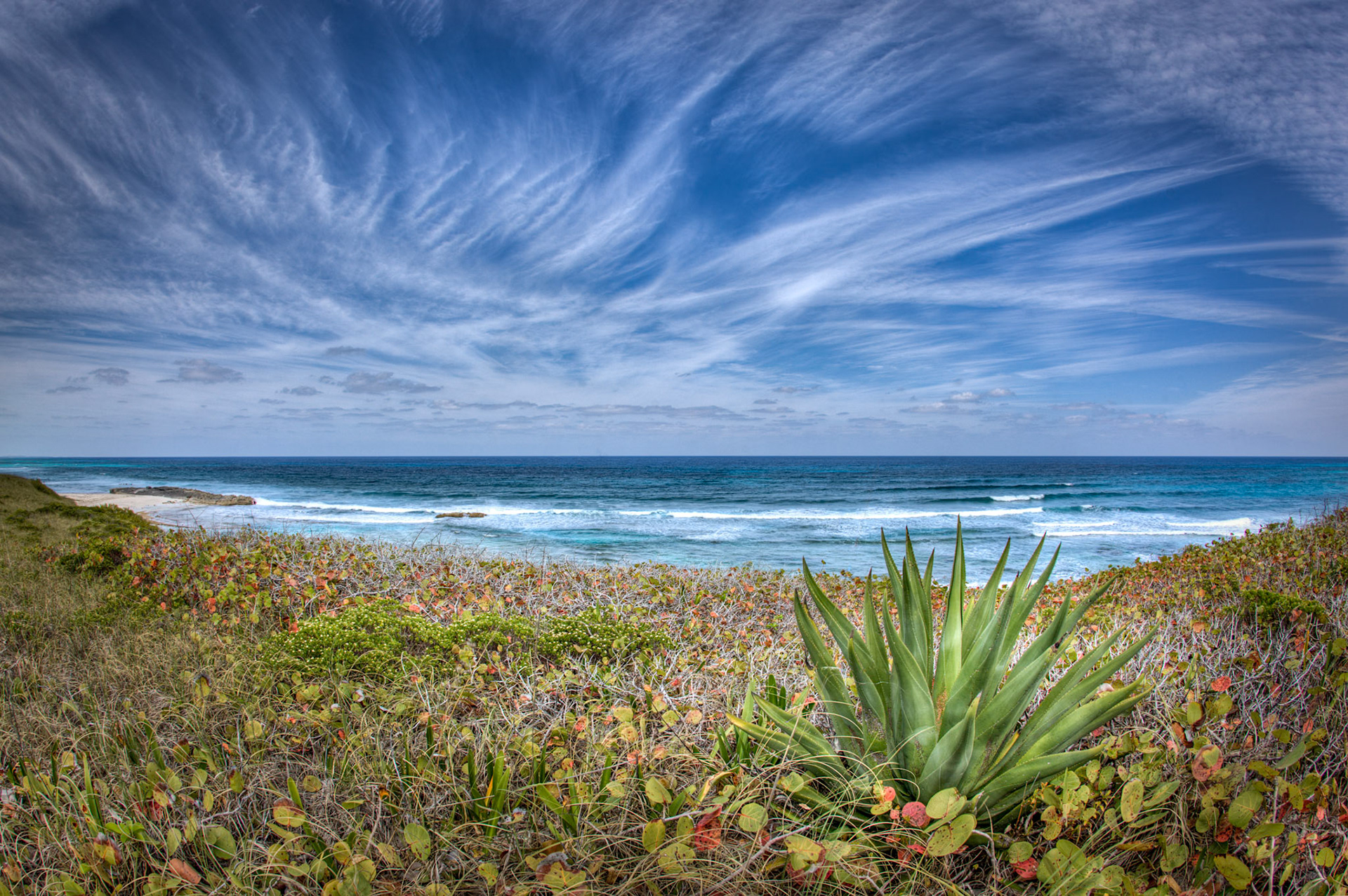 SB377 -Surfers Beach is the most widely known surf break in the BAHAMAS. Surfers Beach is located 2 1/2 miles south of Gregory Town.