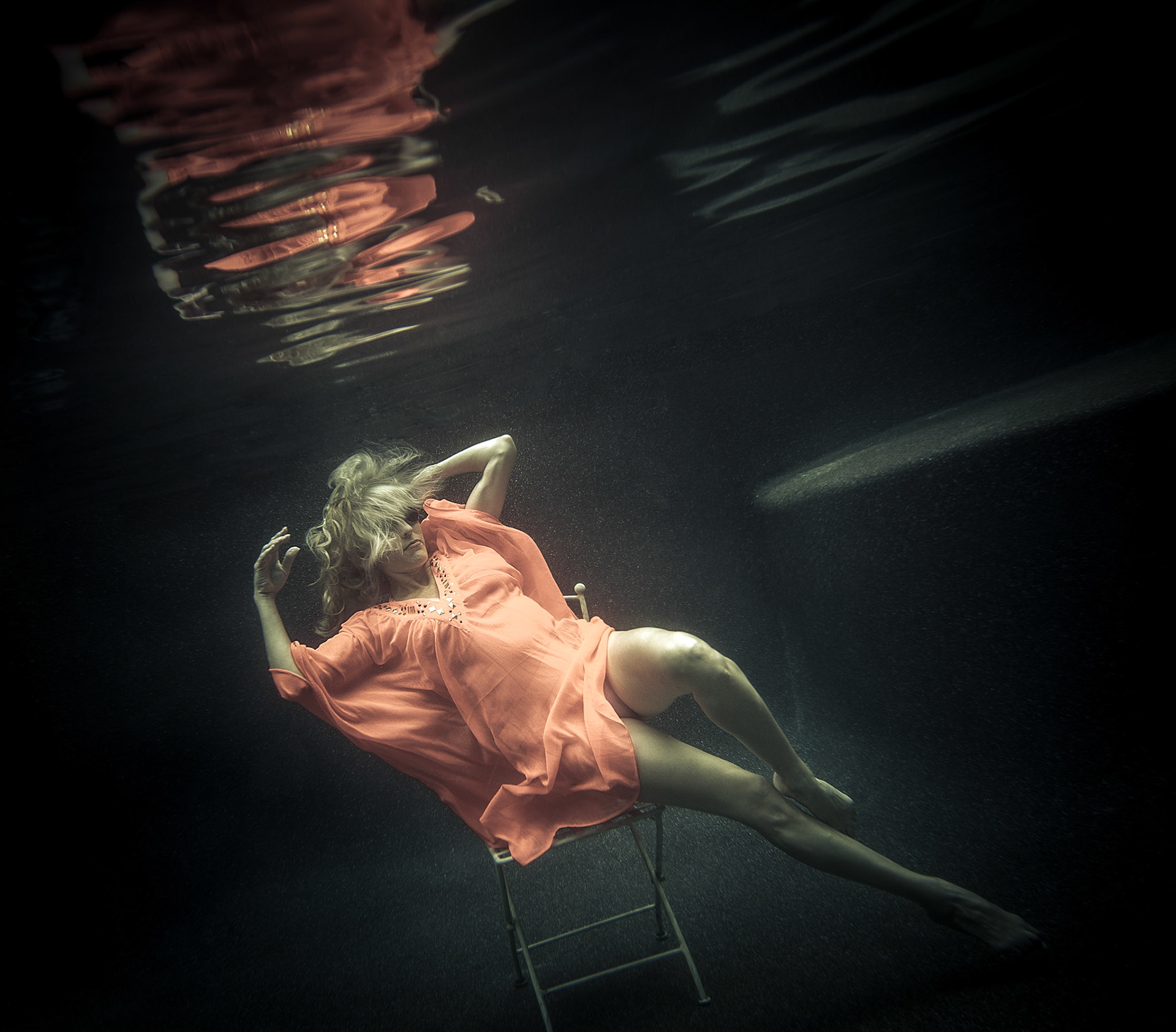 5045-Models demostrating that fashion works underwater as well as above.