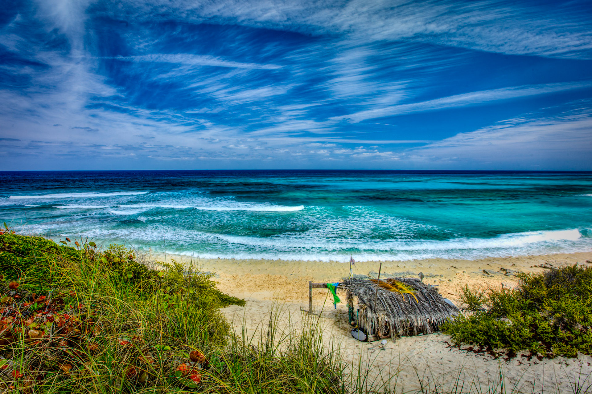 SB375 -Surfers Beach is the most widely known surf break in the BAHAMAS. Surfers Beach is located 2 1/2 miles south of Gregory Town.