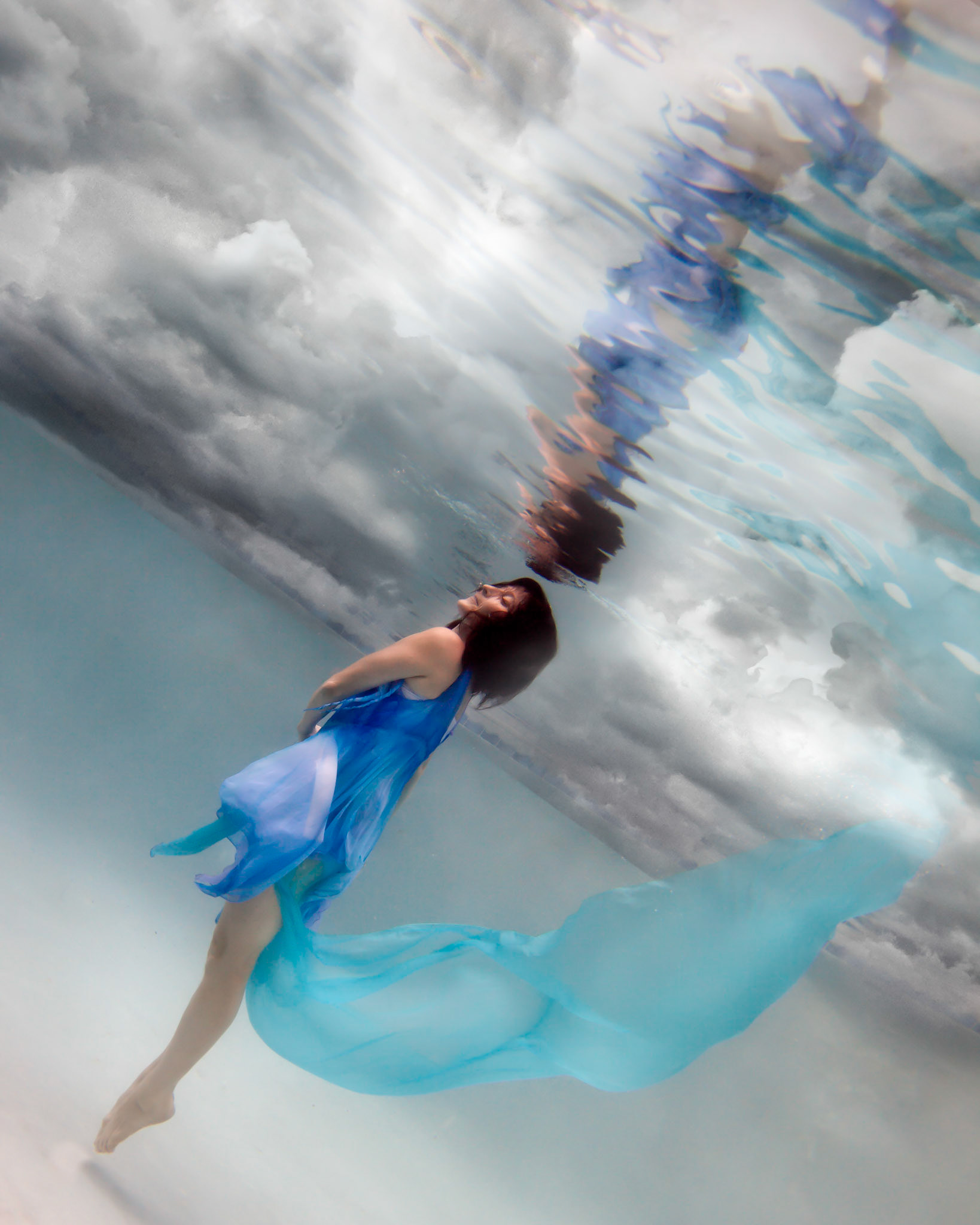 5056-Models demostrating that fashion works underwater as well as above.