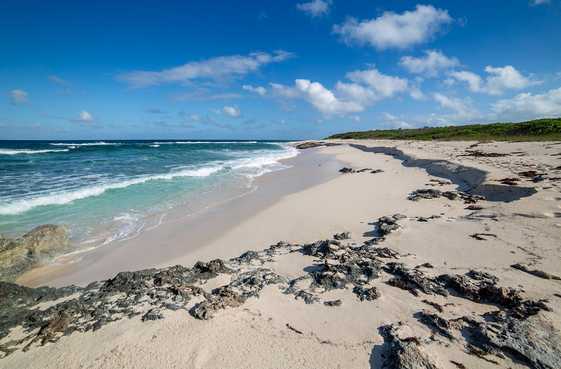 7264-Man Island's area is approximately 35 acres (140,000 m2) owned by a number of individuals residing in the Bahamas, The United States and Europe. The island's proximity to Harbour Island (capital Dunmore Town) has aroused investor interest because of Harbour Island's increased tourist popularity.