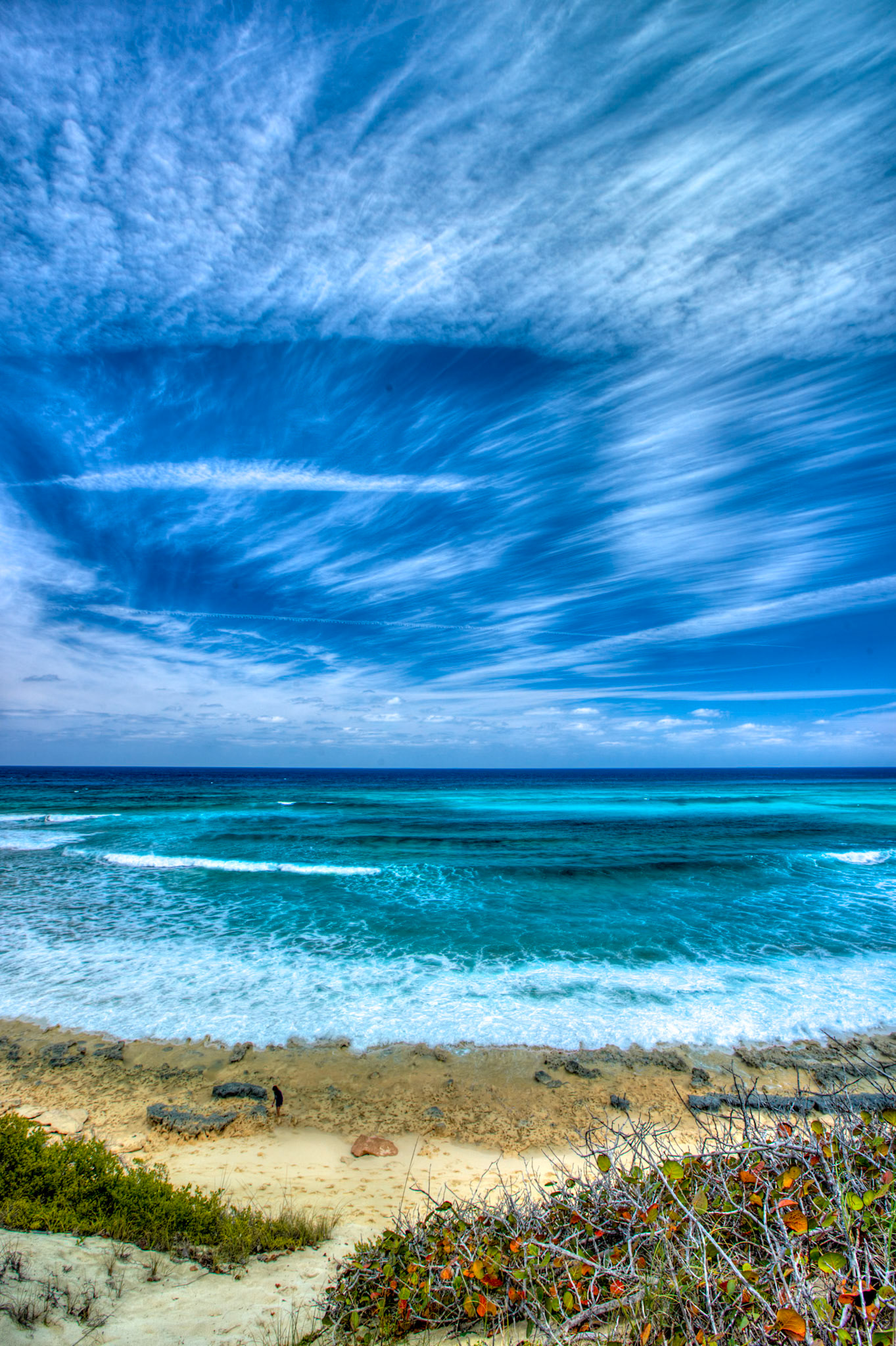 SB372 -Surfers Beach is the most widely known surf break in the BAHAMAS. Surfers Beach is located 2 1/2 miles south of Gregory Town.