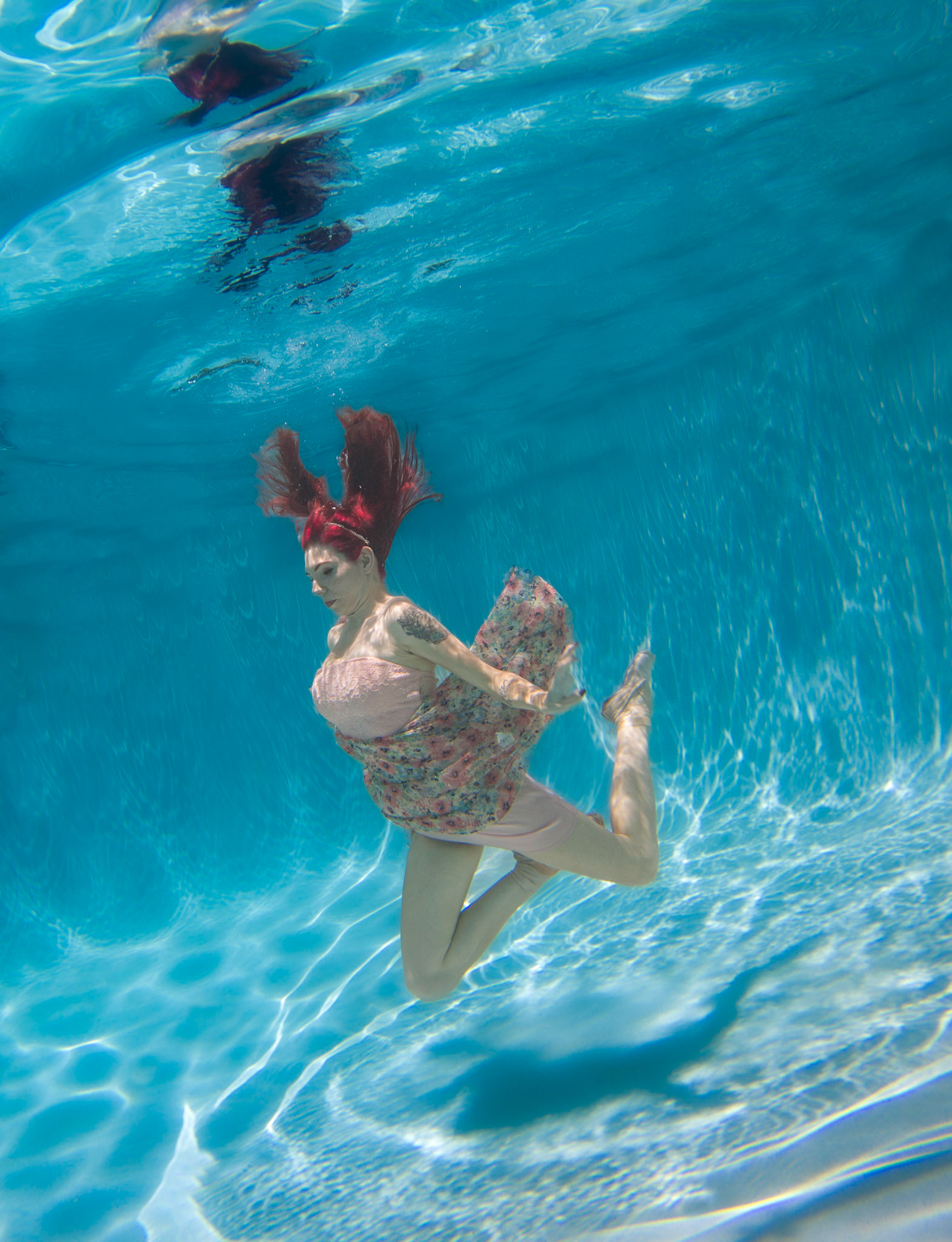 Alex - 3212 Alexandria modeling in the pool.