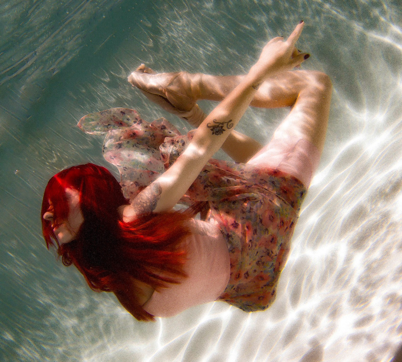 Alex - 3213 Alexandria modeling in the pool.