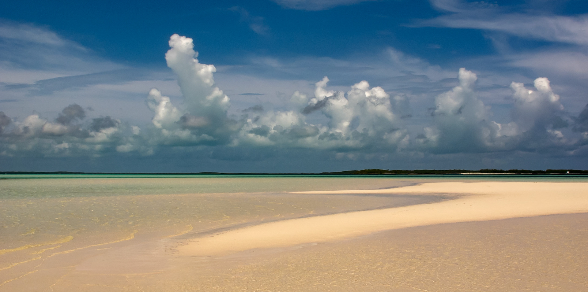 MI005-Man Island's area is approximately 35 acres (140,000 m2) owned by a number of individuals residing in the Bahamas, The United States and Europe. The island's proximity to Harbour Island (capital Dunmore Town) has aroused investor interest because of Harbour Island's increased tourist popularity.