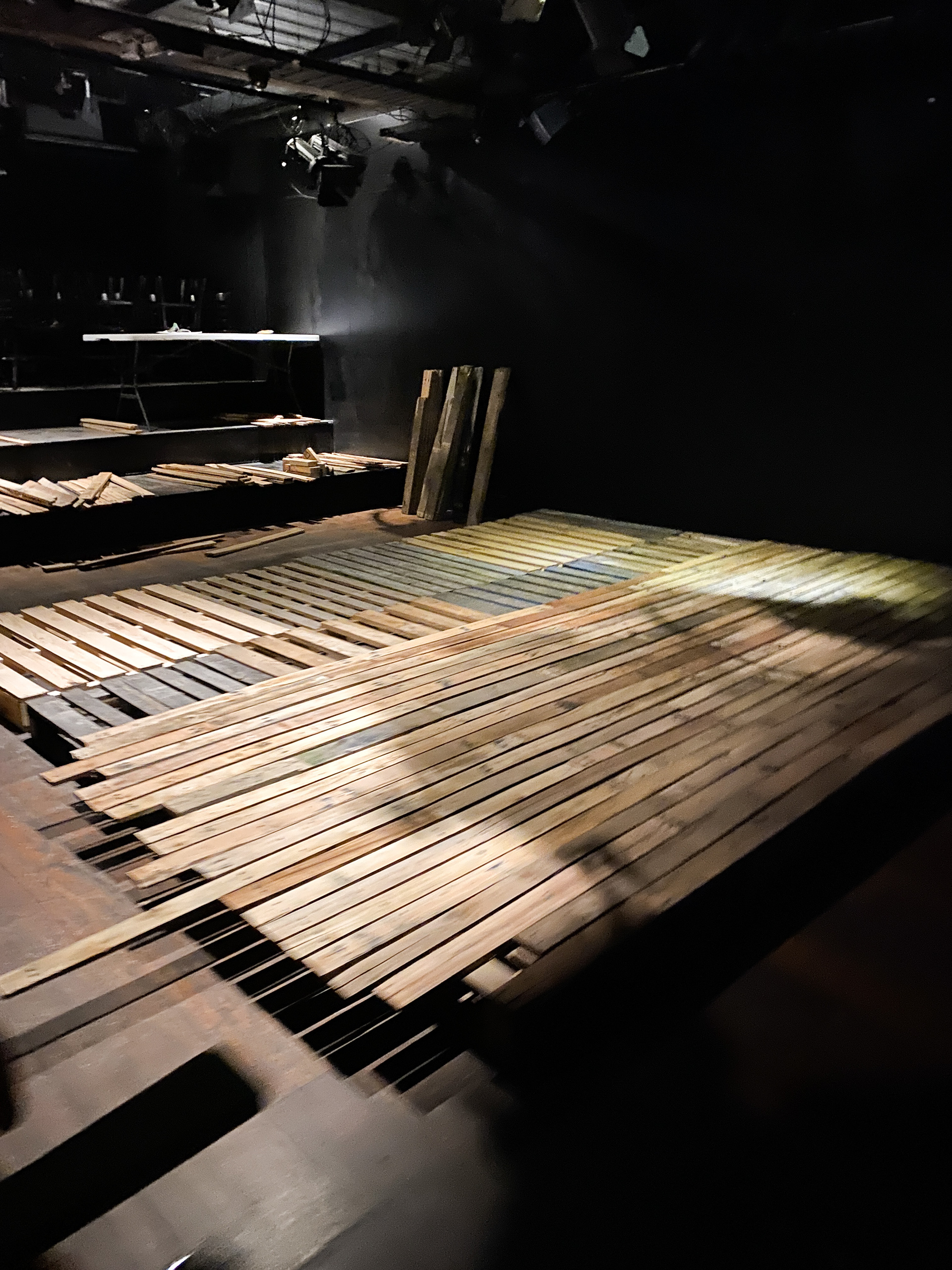 Platform and floor boards made entirely from discarded wood pallets