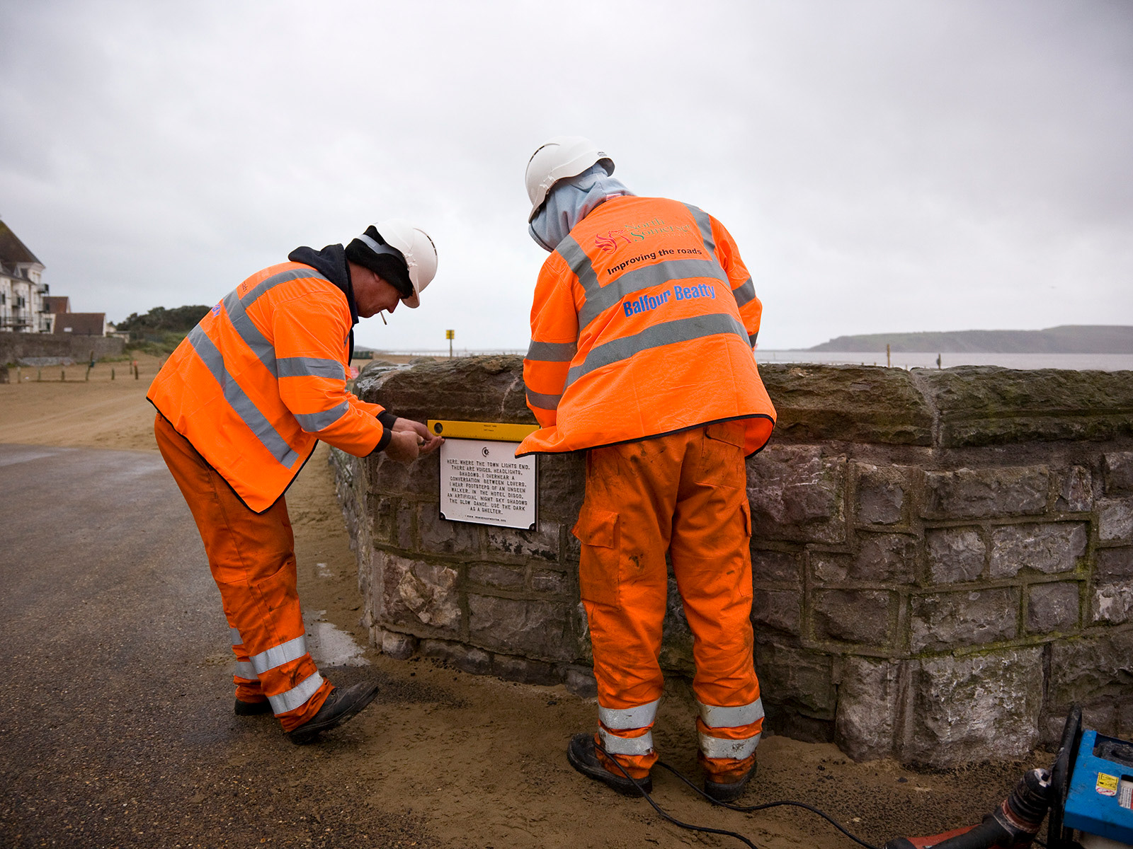 A sign being installed on Marine Parade