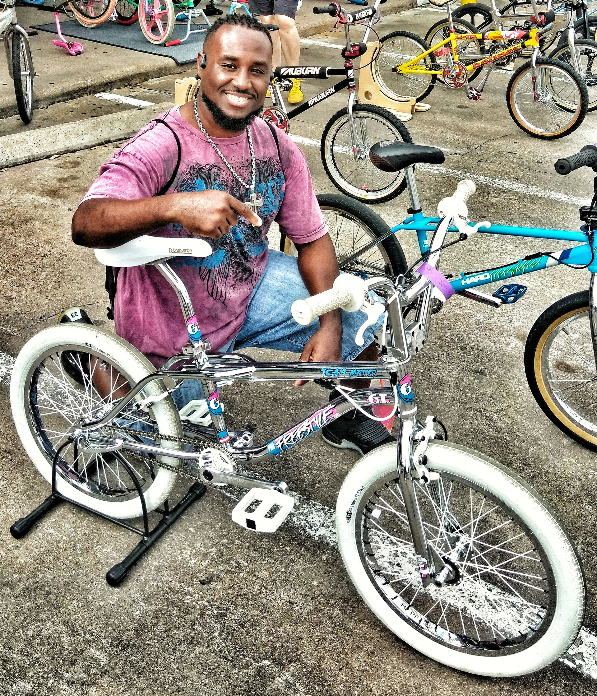 Lavaun Maligie, #vaungie a Houston Tx based digital graphic designer, at the RAD Bike Convention, showcasing custom logo designs and branding expertise.