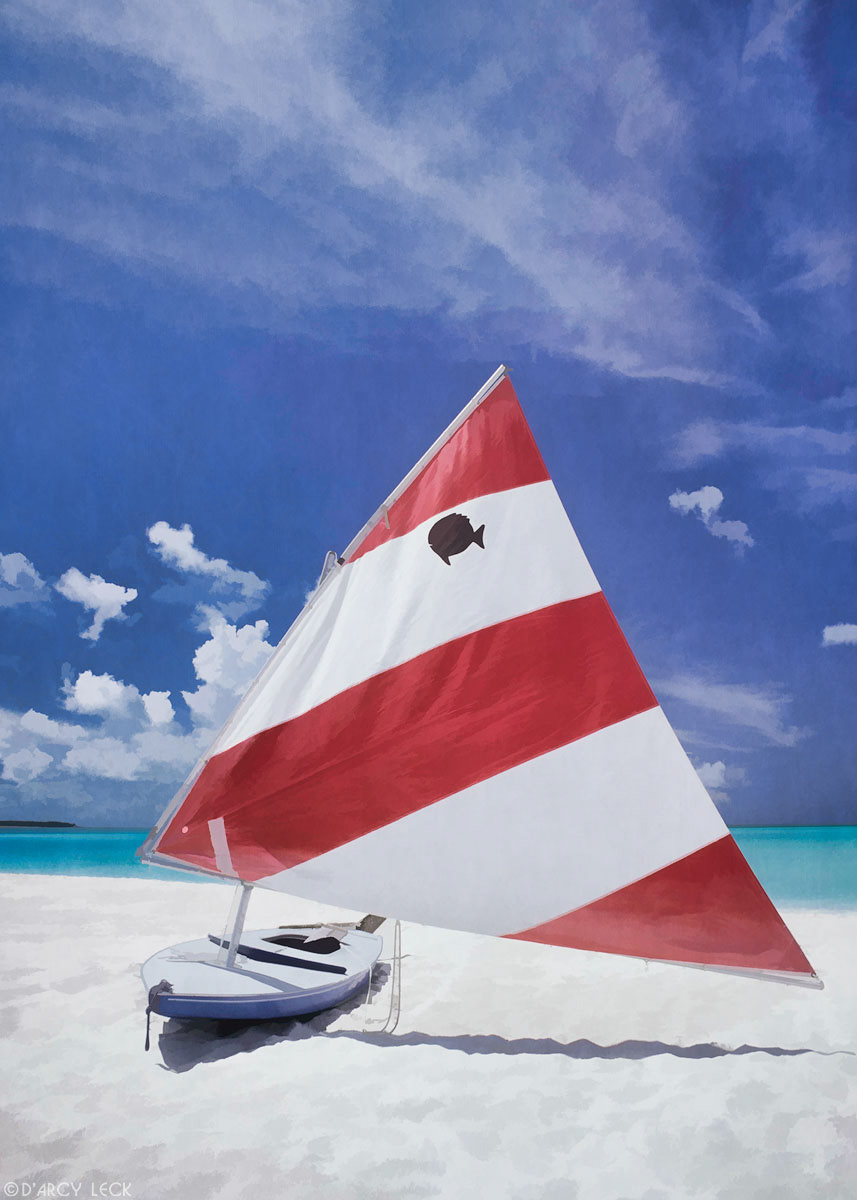 Sunfish sailboat with red and white sail on beach at Treasure Cay Beach, Bahamas