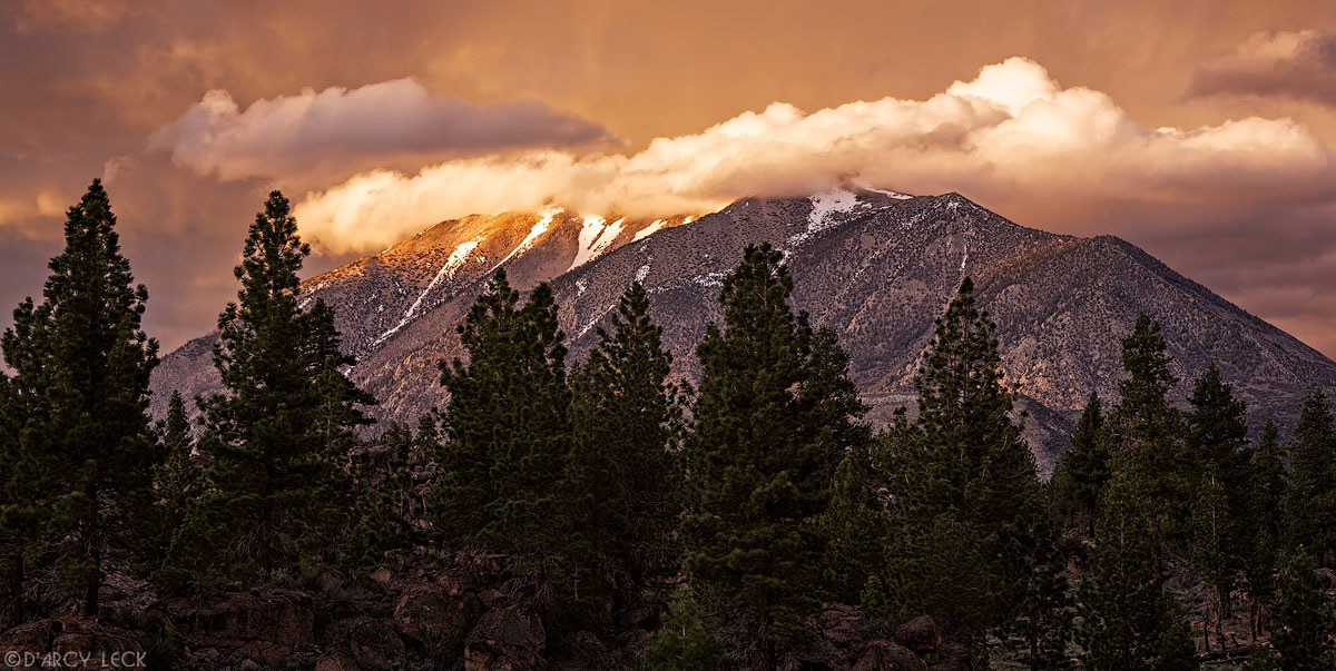 Clearing storm clouds enshroud Wheeler Ridge and Round Valley Peak at sunrise, California