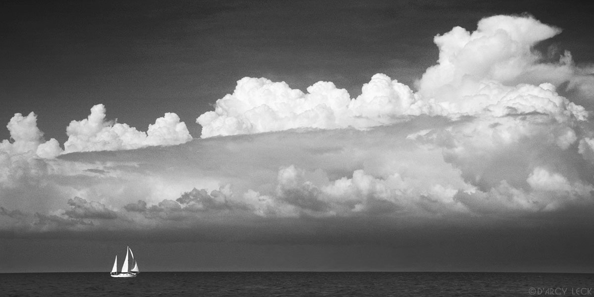 sailboat and approaching storm clouds, Caribbean Sea