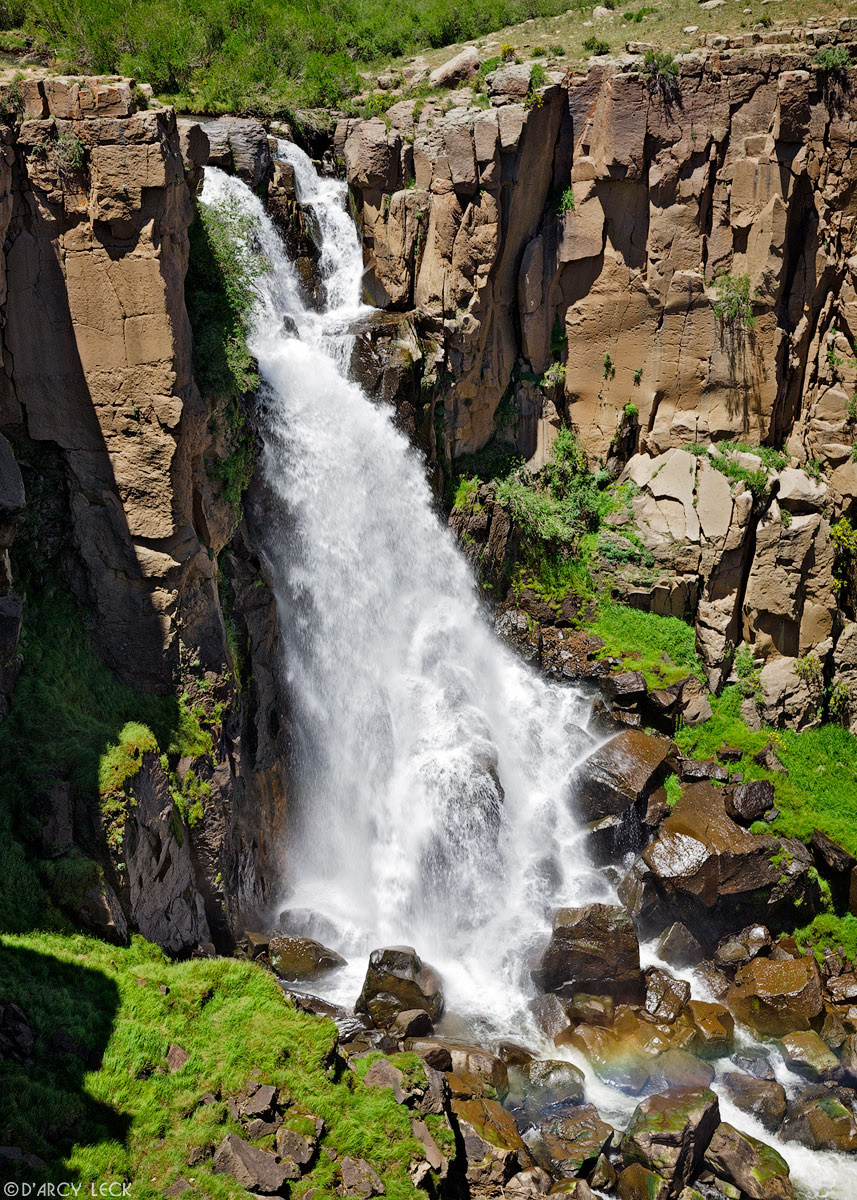 North Clear Creek Falls tumbles into small rocky canyon in the Rio Grande National Forest, Colorado