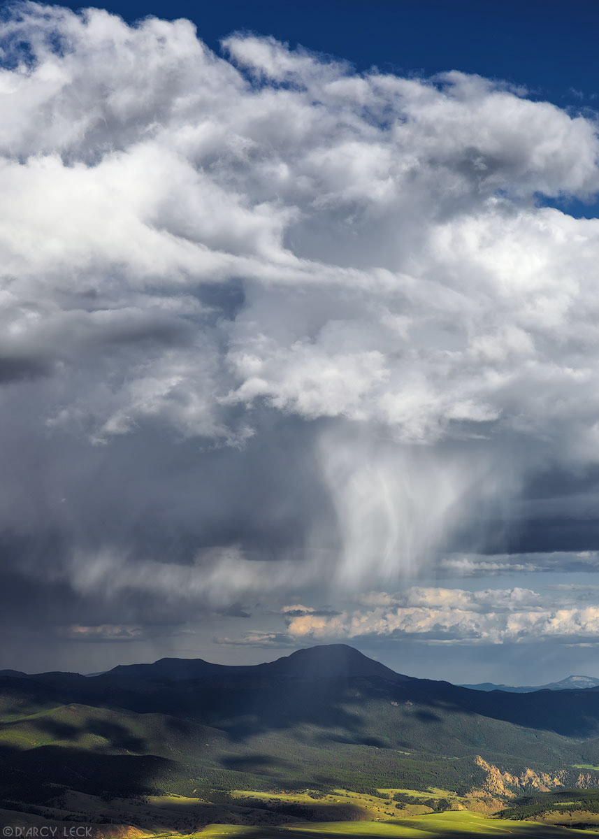Virga falling from clouds as seen from summit of Mount Elbert looking East towards the Mosquito Range Mountains, Colorado