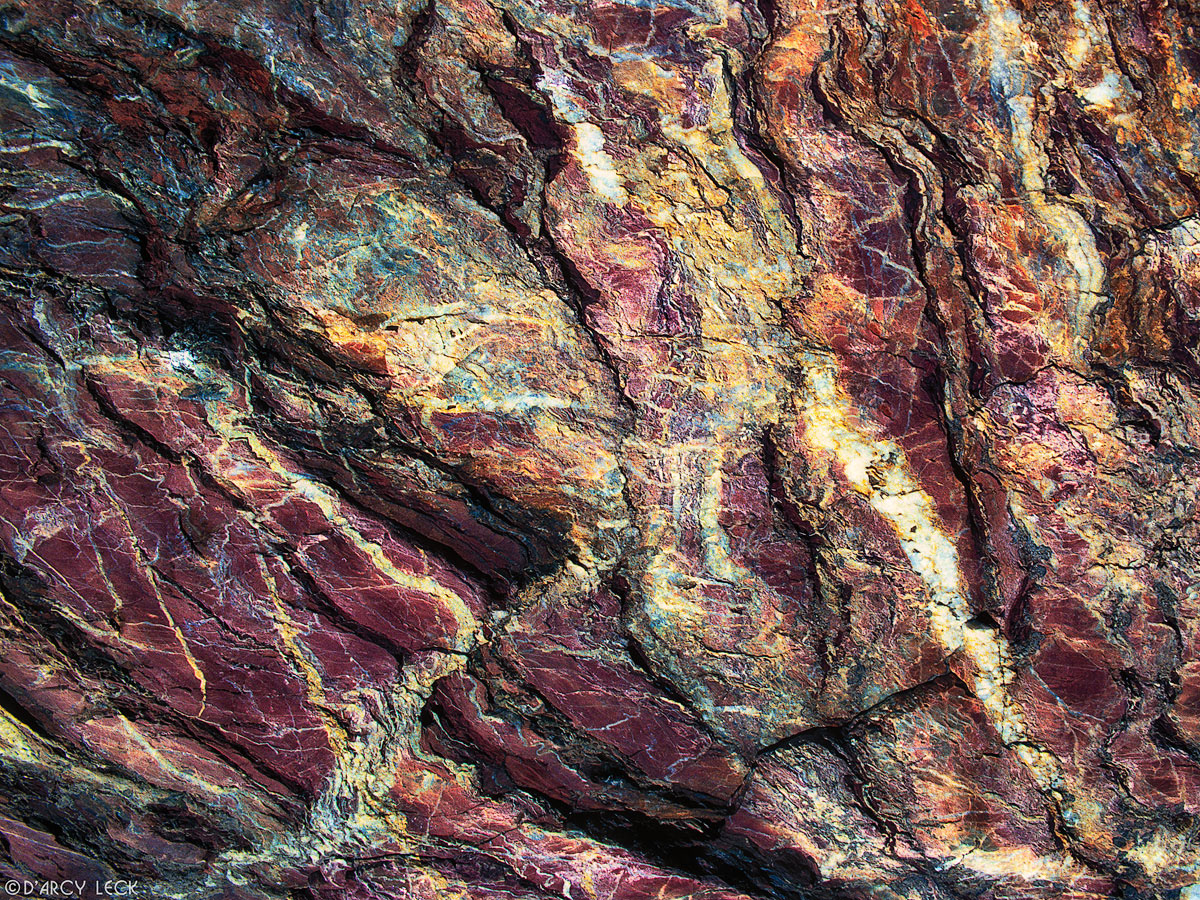 Veins and patterns in granite rock surface