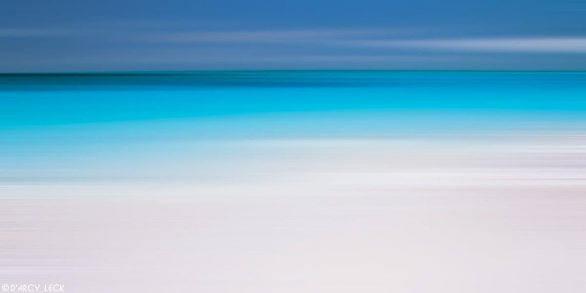 White sand beach with aquamarine waters beyond at Treasure Cay, Bahamas