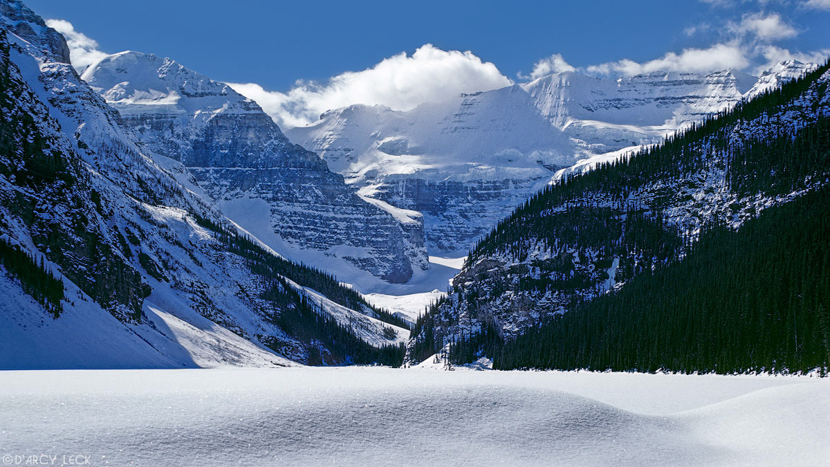 Mount Victoria and snow covered Lake Louise in winter, Banff National Park, Alberta, Canada