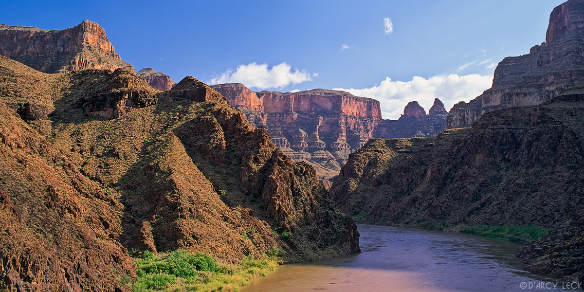 Colorado River flows past steep canyon walls near 243 Mile in Grand Canyon National Park, Arizona