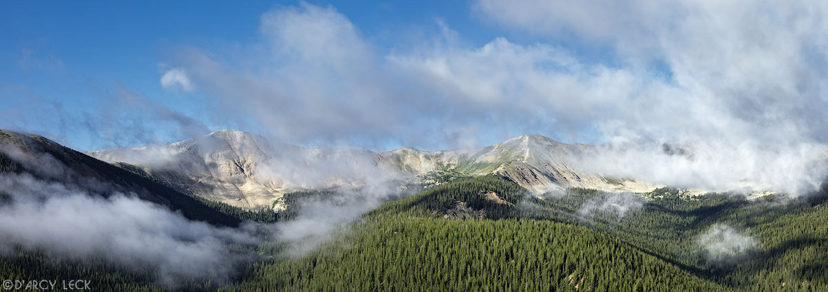 Morning fog clears from forest valleys and Green Mountain near Cumberland Pass, Colorado