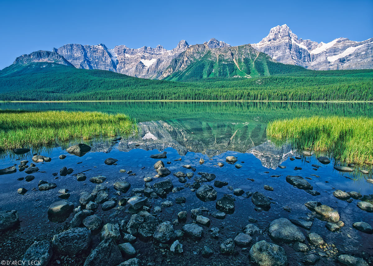 Waputik Mountains rise beyond Upper Waterfowl Lake, Banff National Park, Canada