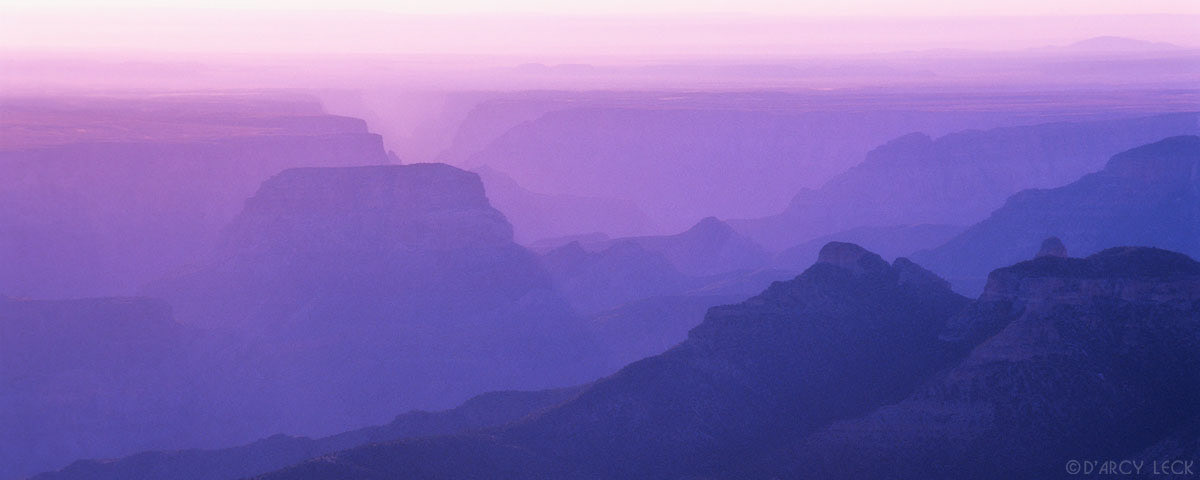 Dawn light illuminates the buttes and cliffs of the Grand Canyon at Point Imperial, Grand Canyon National Park, Arizona