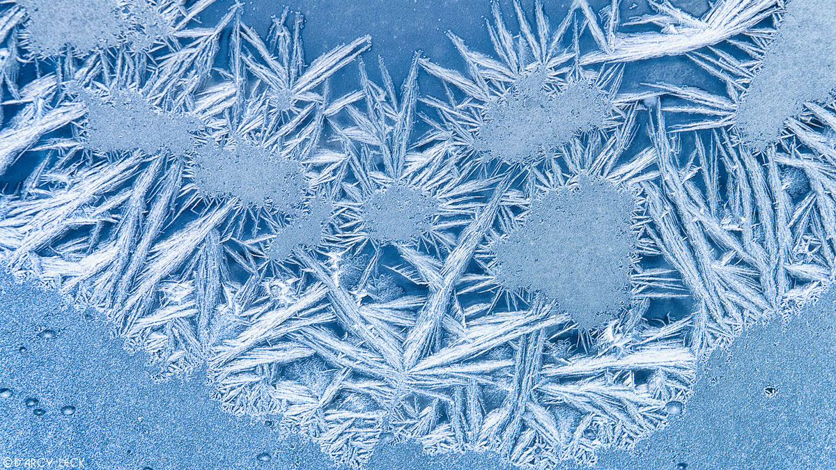 Frost crystals on window pane