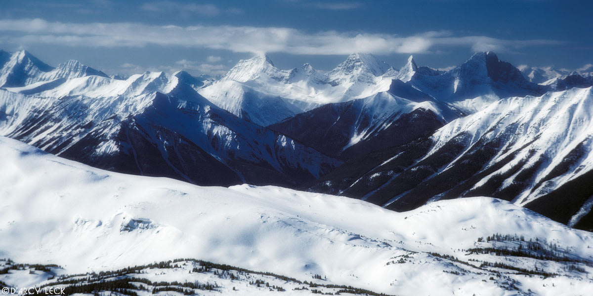 Winter snow covers Mitchell Range in the Rocky Mountains, Canada