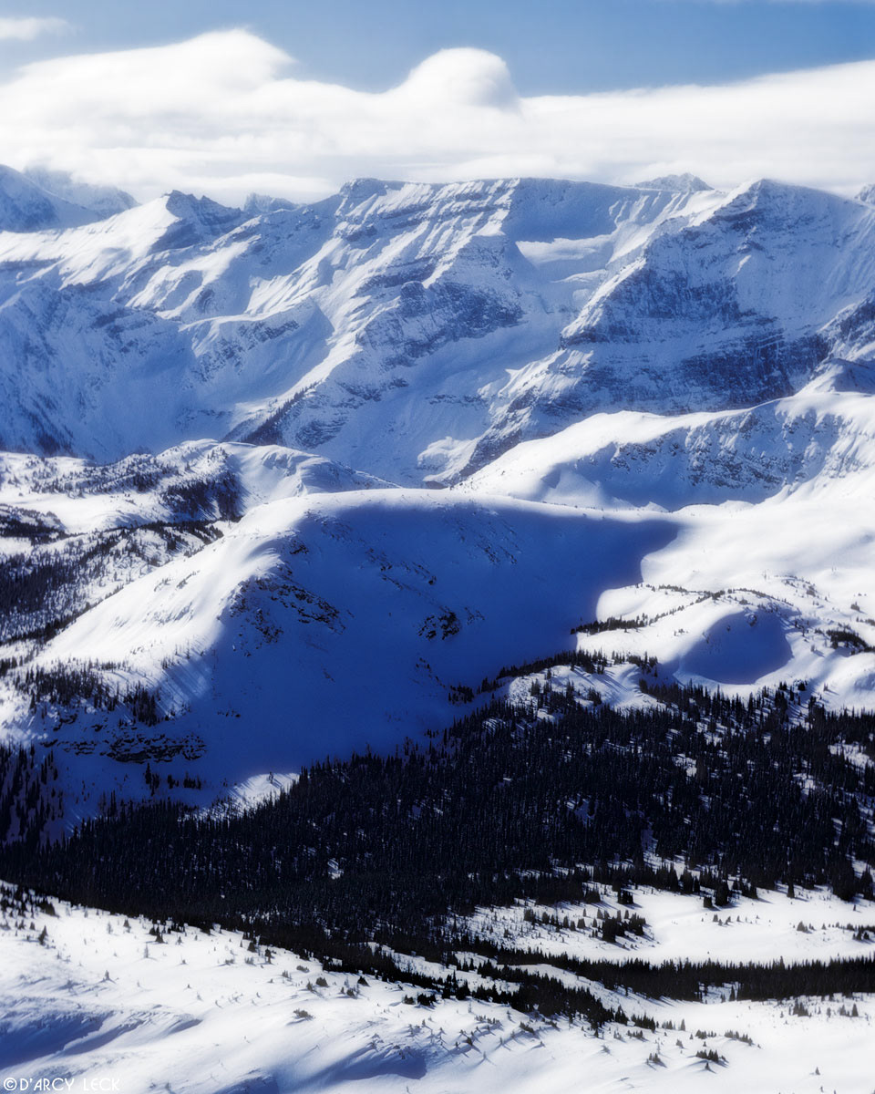 Winter snow covers Mitchell Range in the Rocky Mountains, Canada