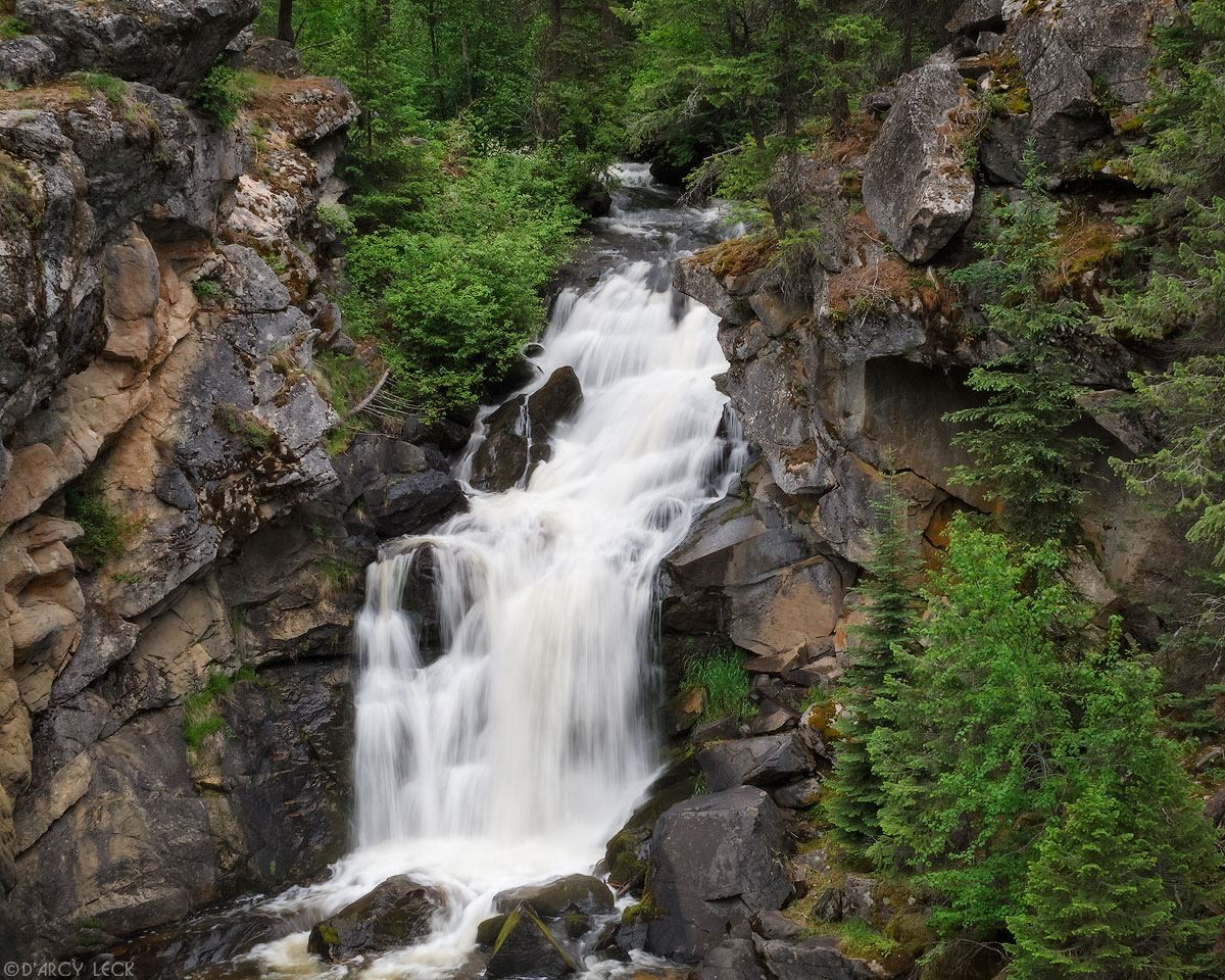 Little Pend Oreille River tumbles over rocks at Crystal falls in a small canyon, Washington