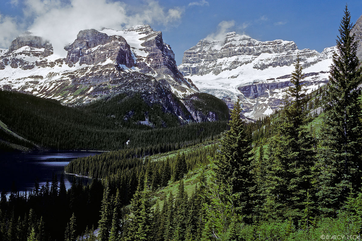 Mt. Gloria and Lunette Peak tower above Marvel Lake in Banff National Park, Alberta, Canada