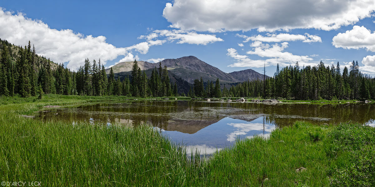 Mount Yale reflects in Hartenstein Lake on a summer day, Colorado