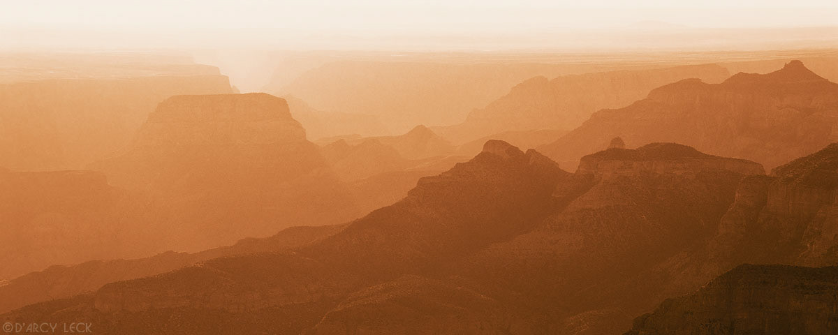 Sunrise illuminates the buttes and cliffs of the Grand Canyon at Point Imperial, Grand Canyon National Park, Arizona