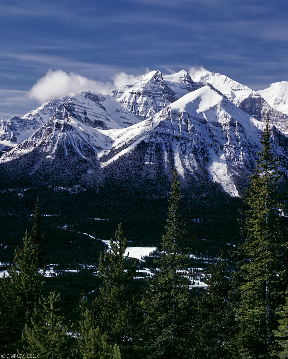 Mount Fairview and Mount Victoria rise above the Bow River Valley in winter, Banff National Park, Alberta, Canada