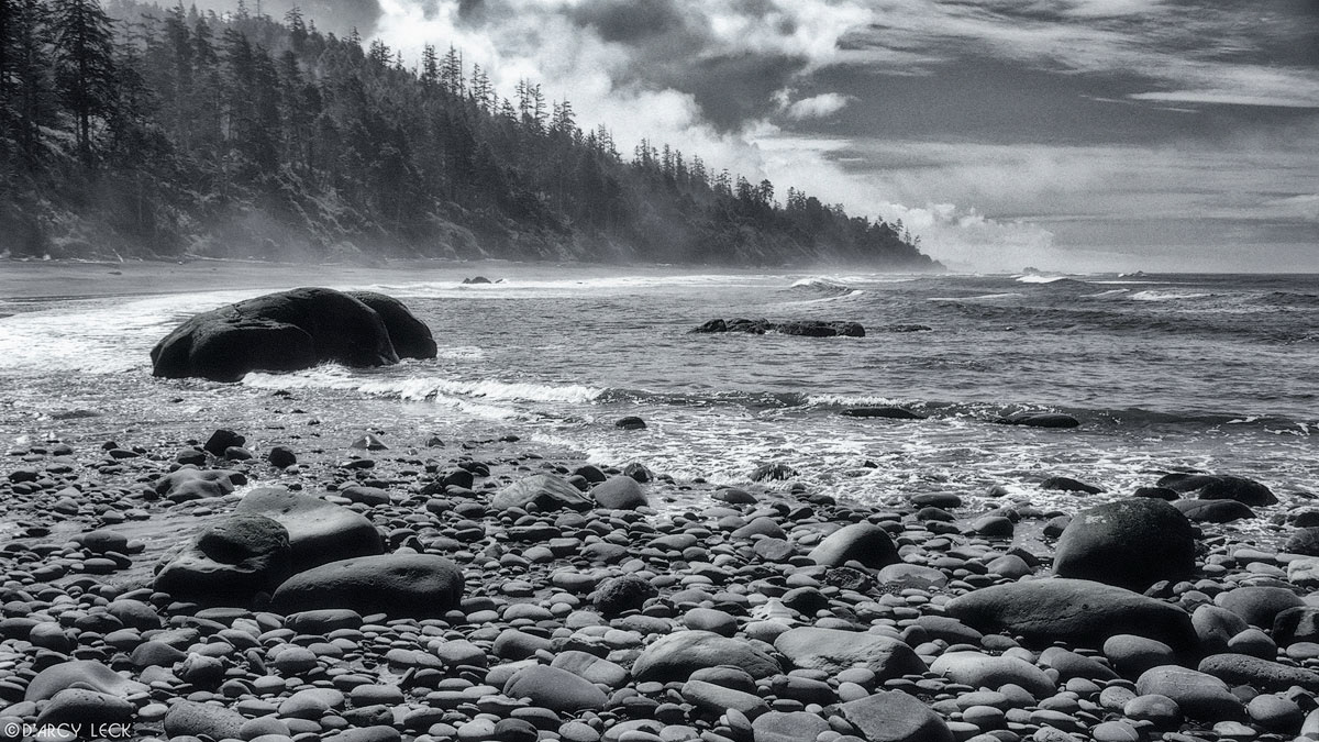 Wave polished stones along shore, Washington