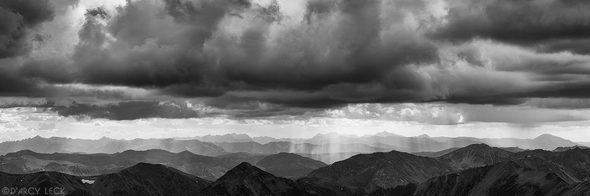 View from summit of Mount Elbert looking Northwest into the Sawatch Range mountains with storm clouds forming, Colorado