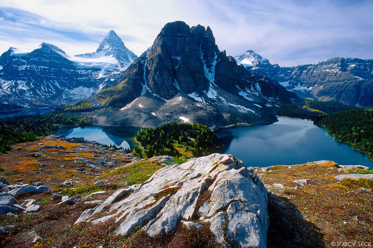 Mount Assiniboine (left center) and Wedgewood Peak (center), with Sunburst Lake and Cerulean Lake.
