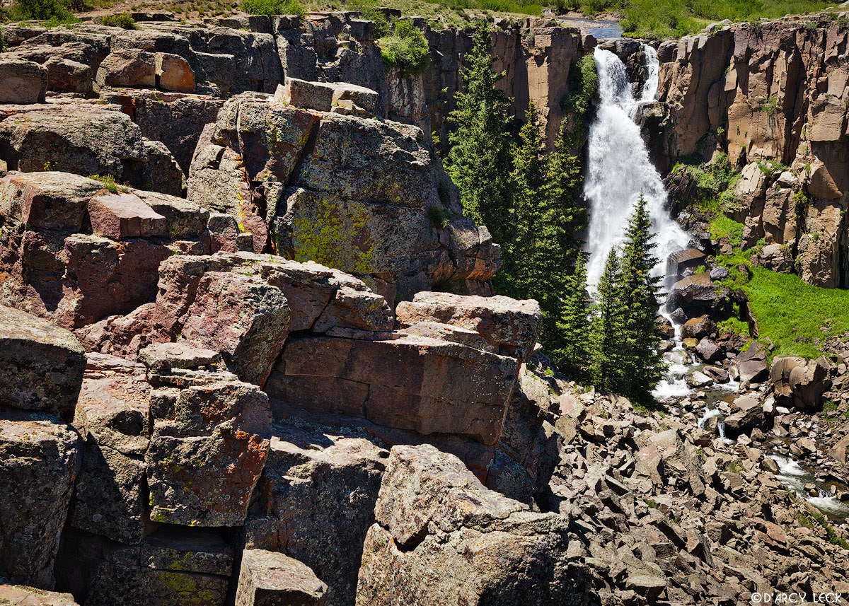 North Clear Creek Falls tumbles into small rocky canyon in the Rio Grande National Forest, Colorado