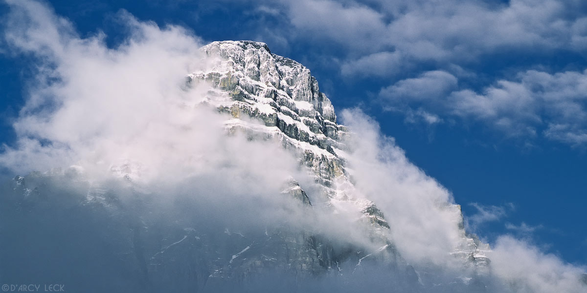 Morning clouds clear from Mount Chephren, Banff National Park, Canada