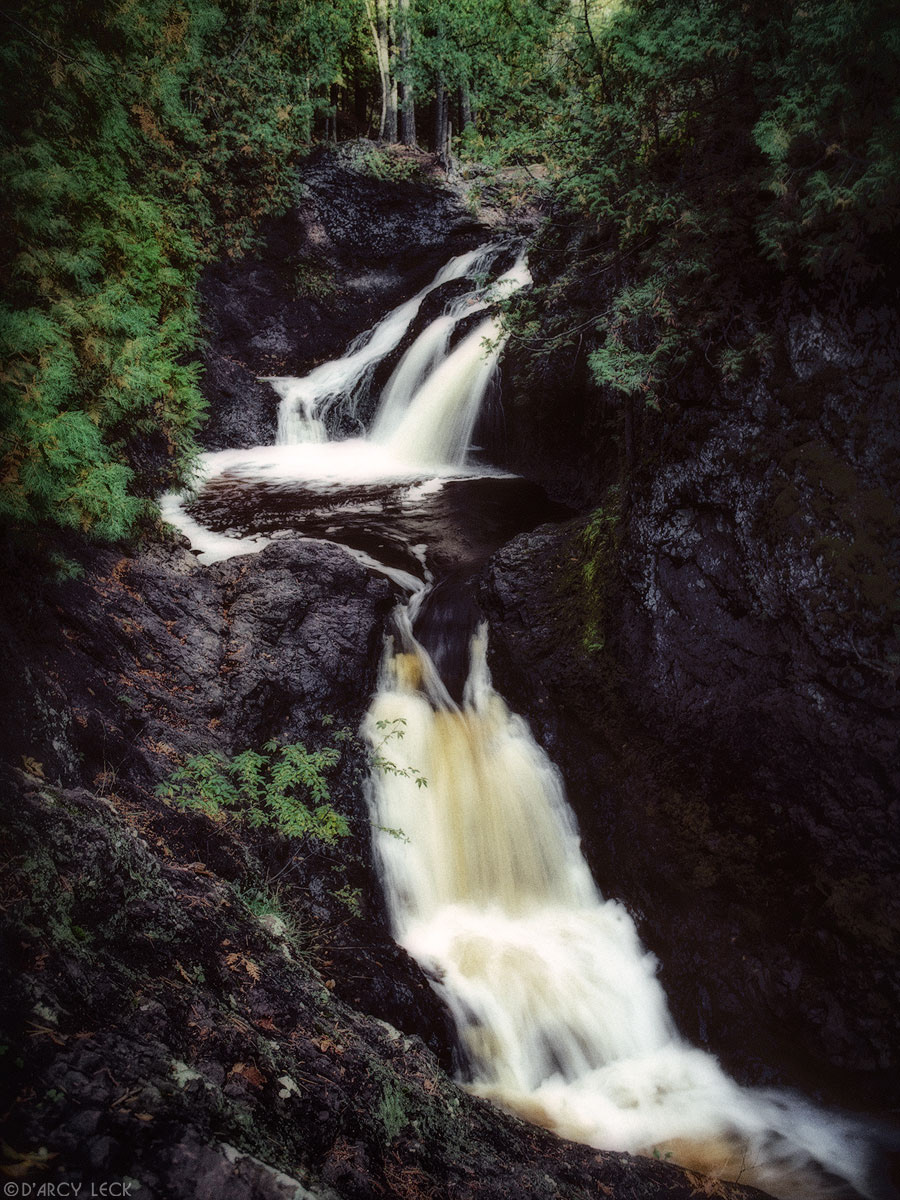 Snake Pit Falls waterfall along river in Amnicon Falls State Park, Wisconsin